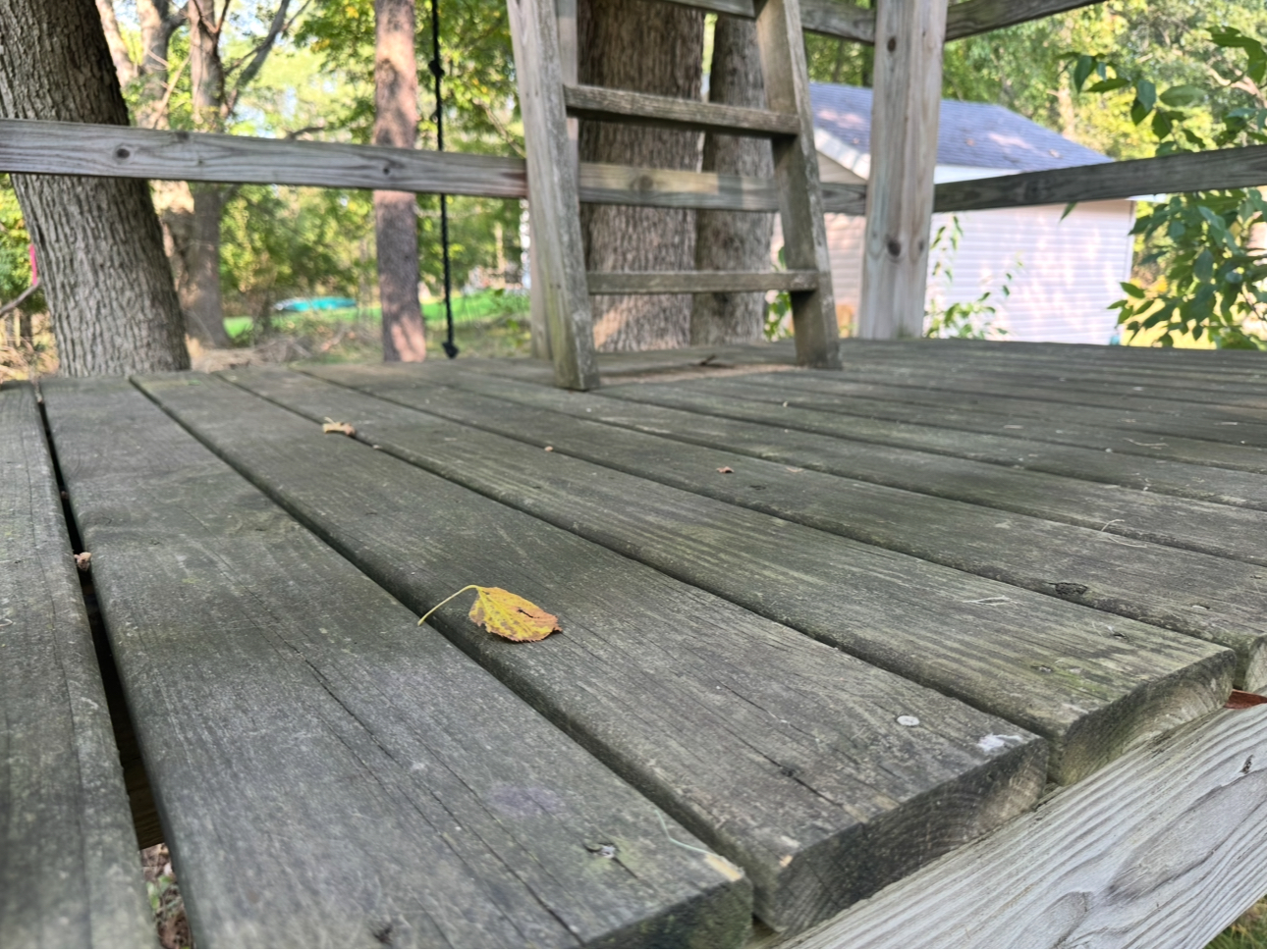Wooden deck after pressure washing — clean and ready to stain